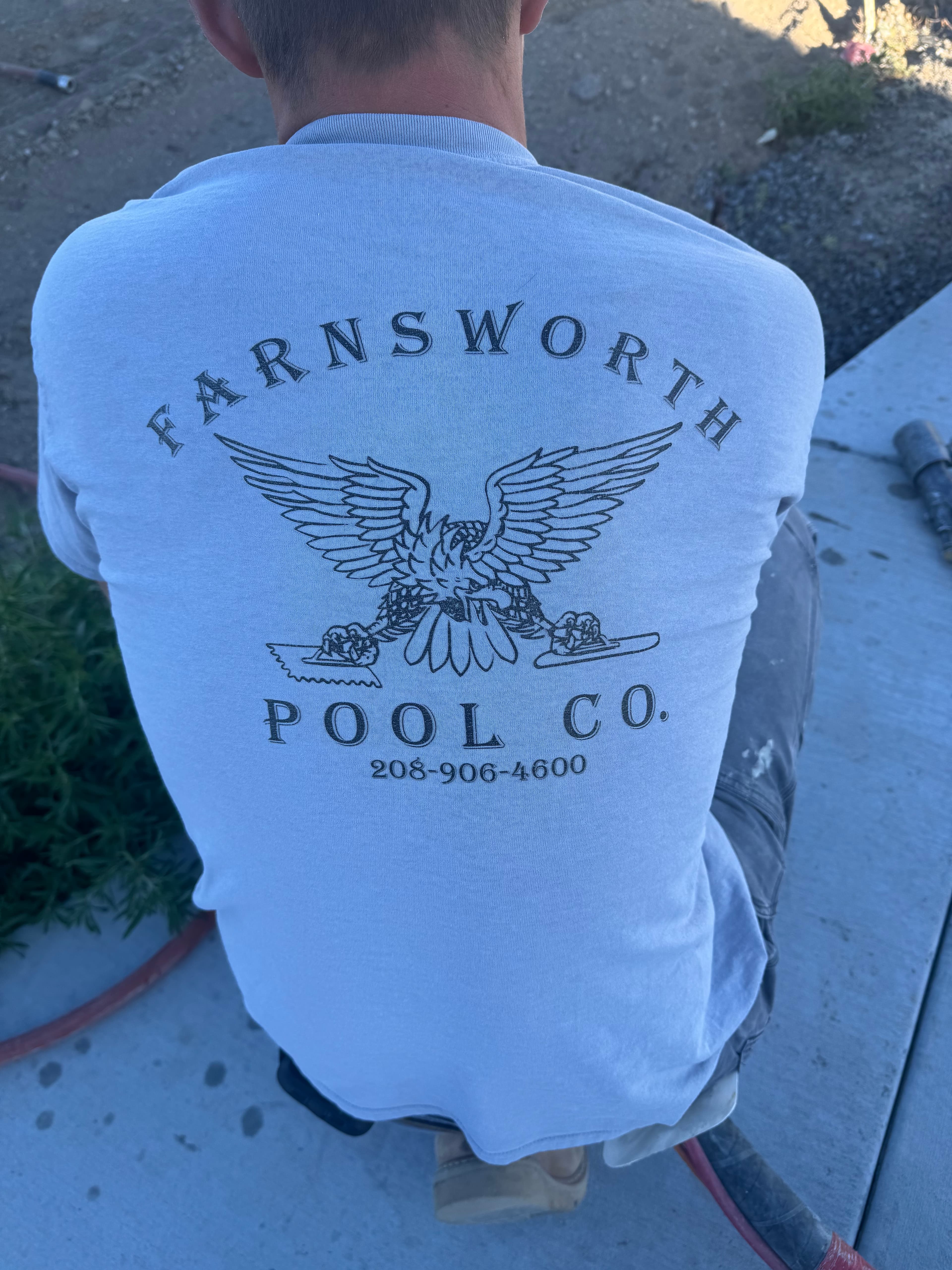 Farnsworth Pool Co. brand shirt on site